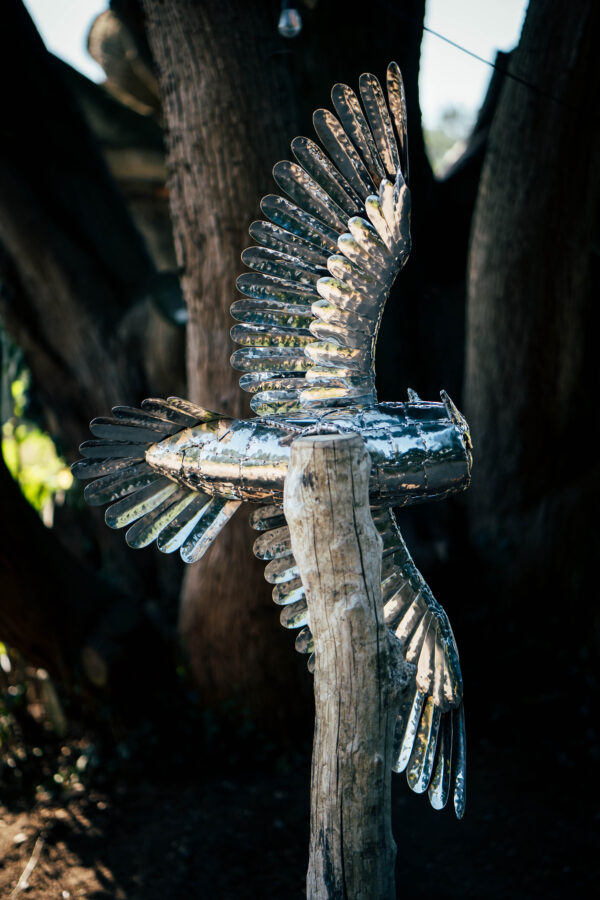 Owl statue for the garden of home. Beiautiful bird sculpture.